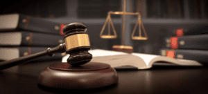 Gavel and scales in law library.